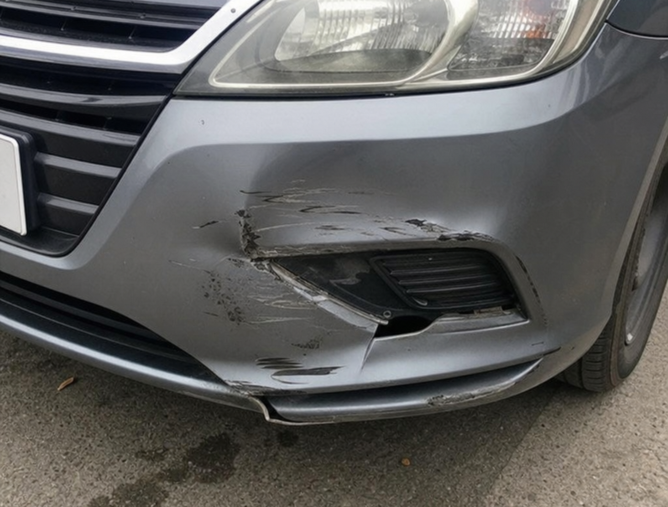 A car bumper with visible damage (1)